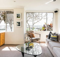 Waterfront Apartment Brimming with Inspirational Artwork - Accommodation Resorts