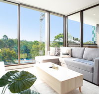 Designer Apartment with Balcony in Quiet Suburb - Accommodation Resorts