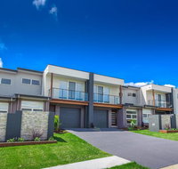 Escape At Nobbys Executive Townhouse 1 74 Pacific Drive - Accommodation Resorts