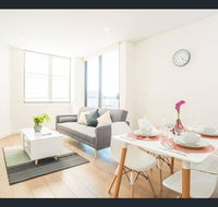 Gorgeous modern brand new two bedroom apartment with large lounge and private garden view balcony - Accommodation Resorts
