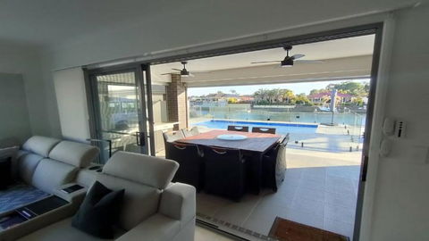 Relax Poolside By The Canal - Accommodation Resorts 0